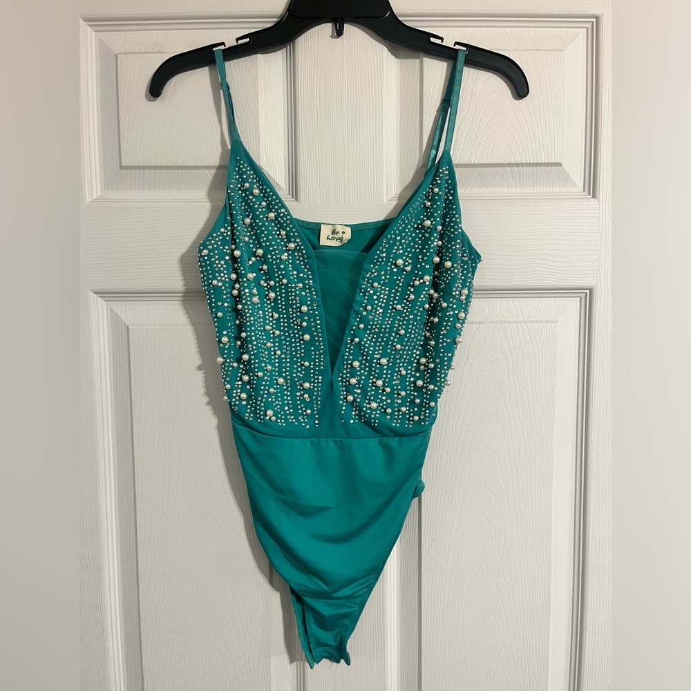 ✨Never worn turquoise bodysuit